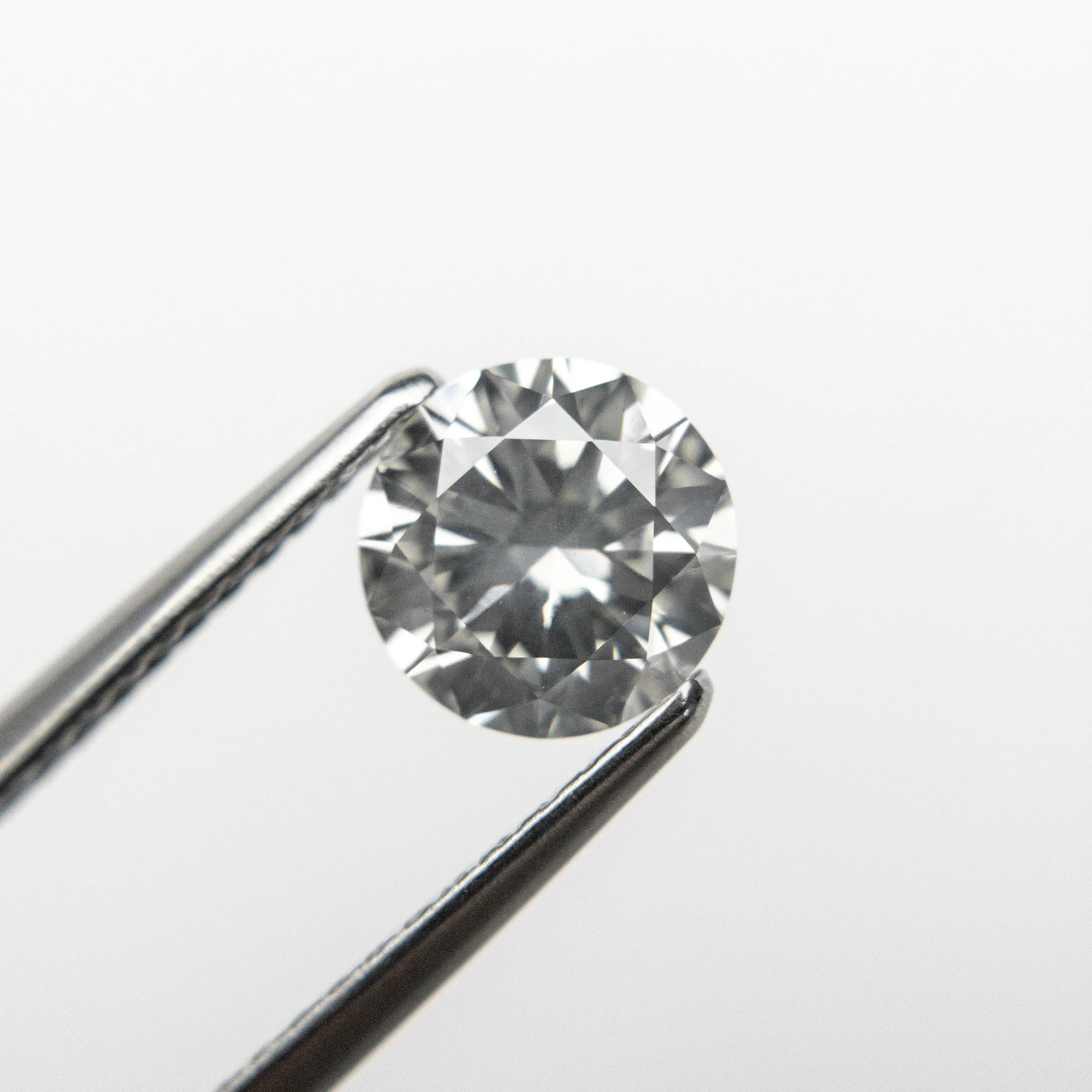 1.01ct 6.40x6.36x3.90mm GIA Faint Grey Round Brilliant 19000-01