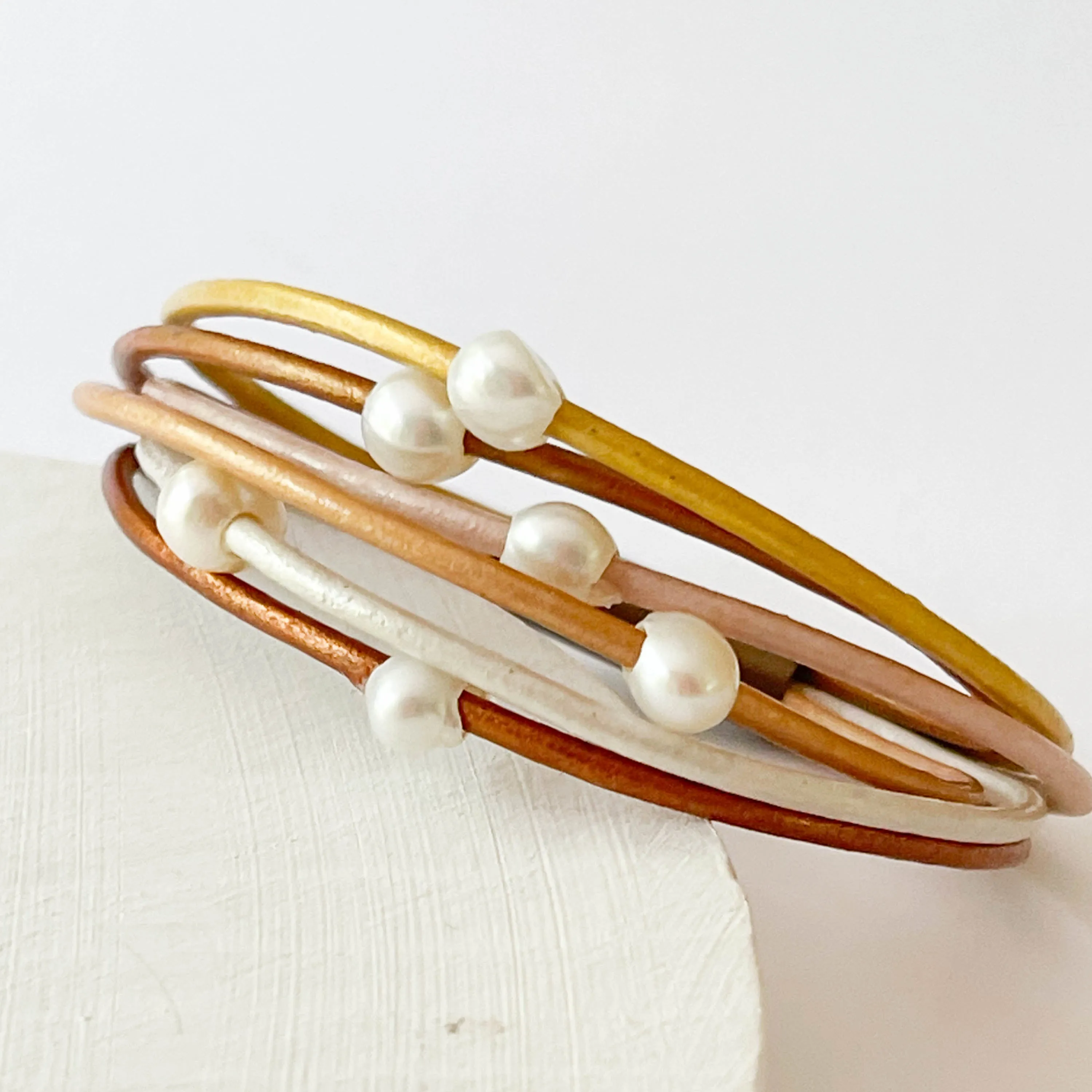 Gold And Six Pearl Shimmer Leather Bracelet