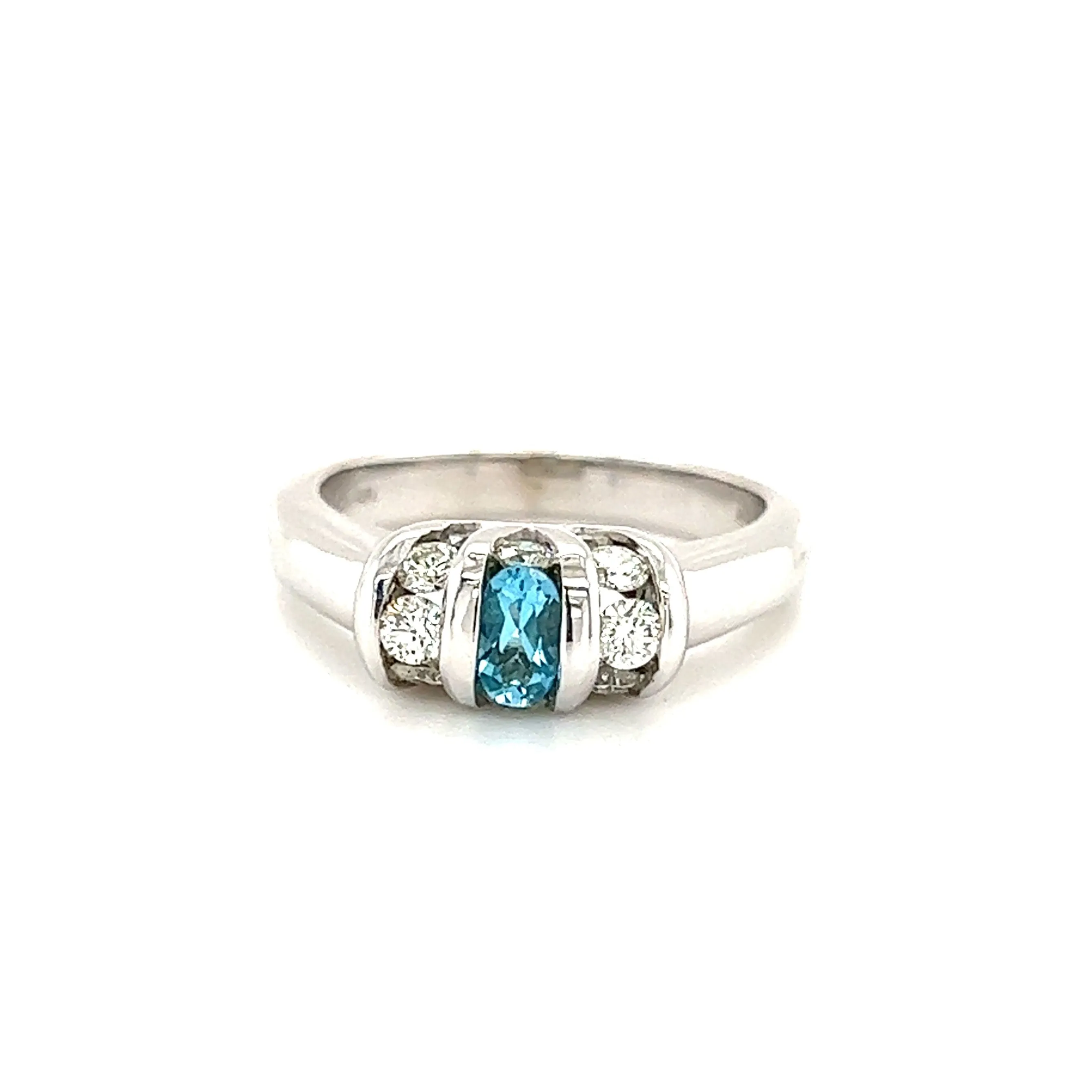 Oval Blue Topaz Ring with Side Diamonds in 14K White Gold