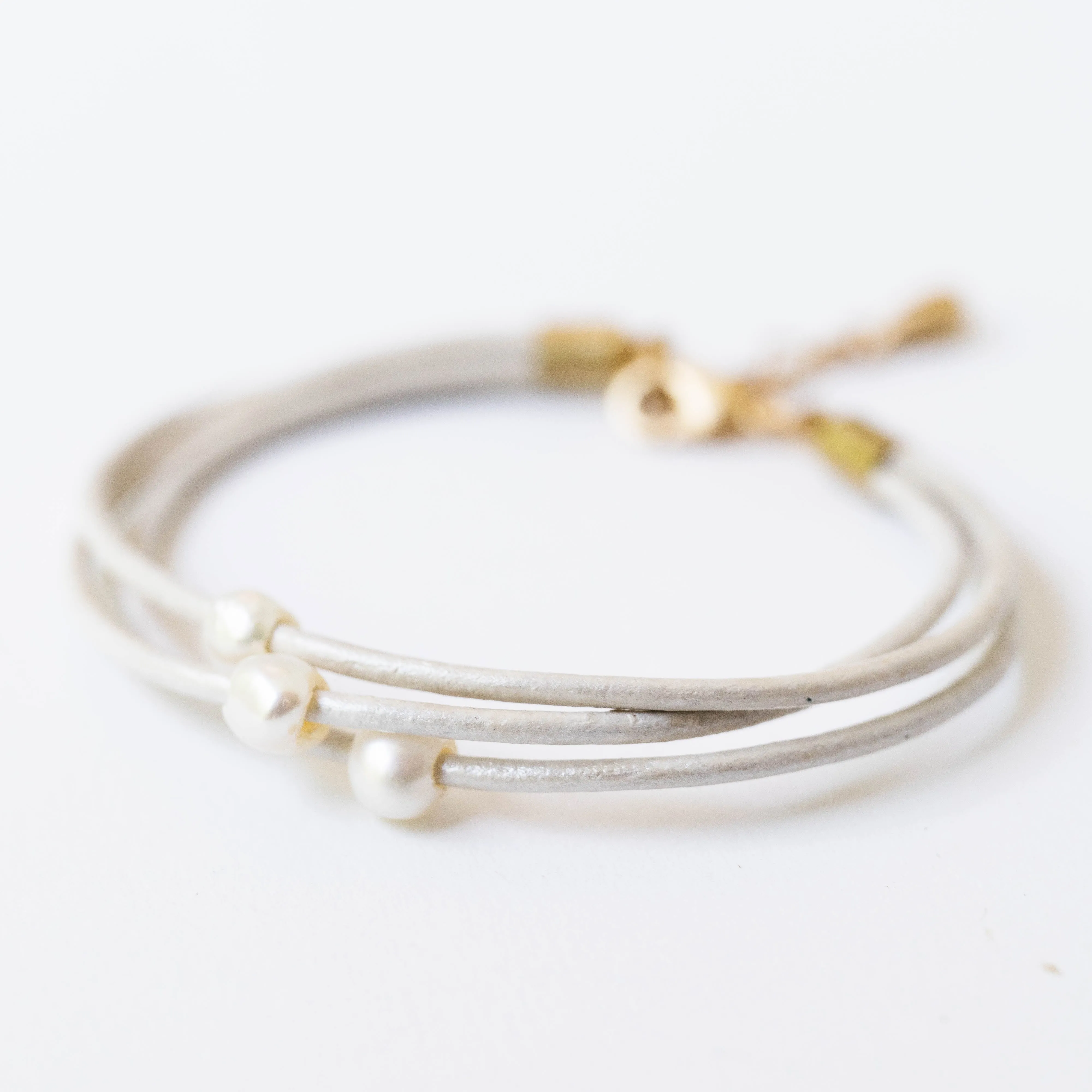 Pearl and leather adjustable shimmer bracelet