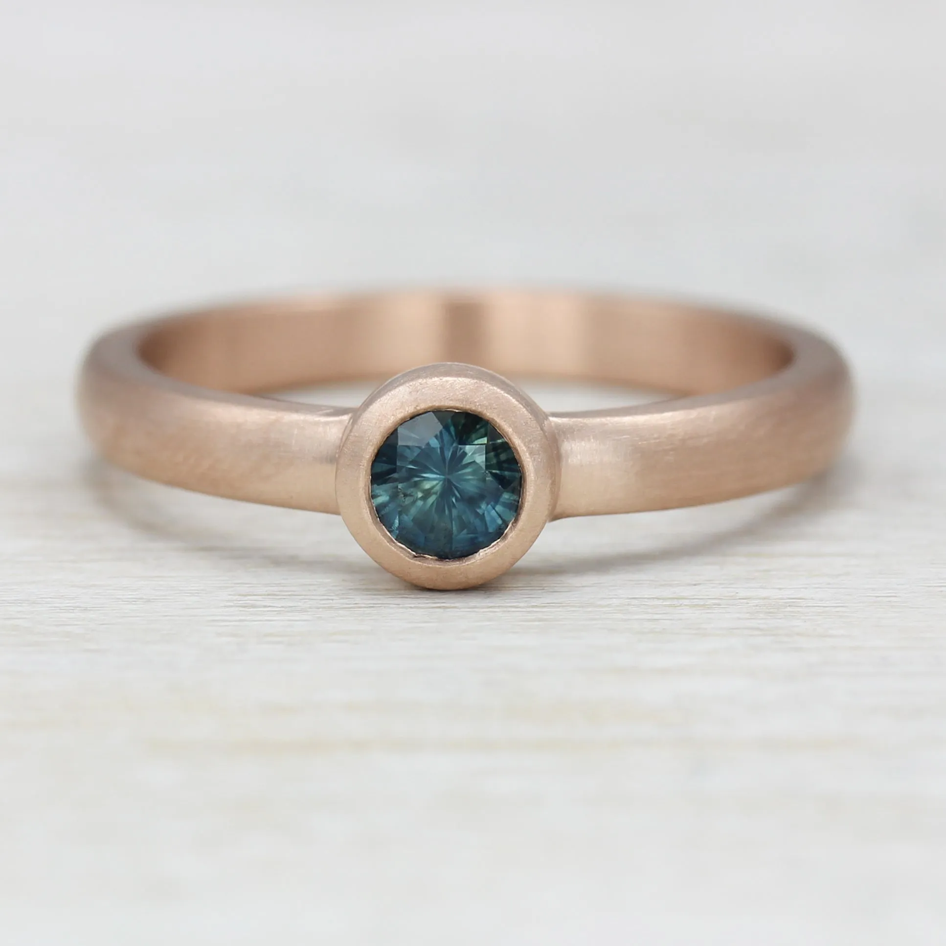 Rose Gold Solitaire with Fair Trade Teal Blue Sapphire